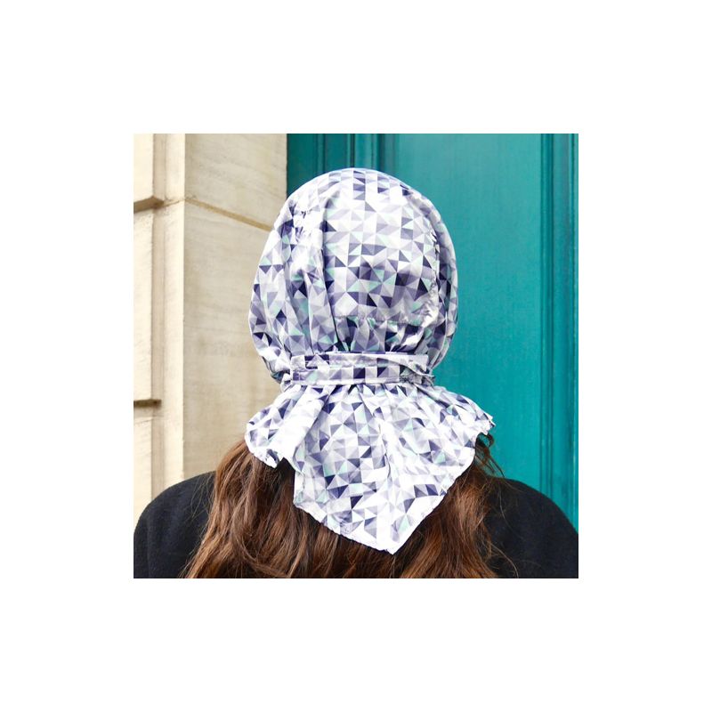 Capuche de pluie motif géométrique