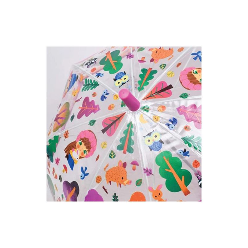 Parapluie cloche transparent dans les bois