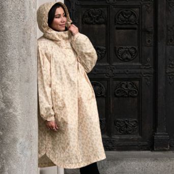 Poncho imperméable ivoire motif léopard