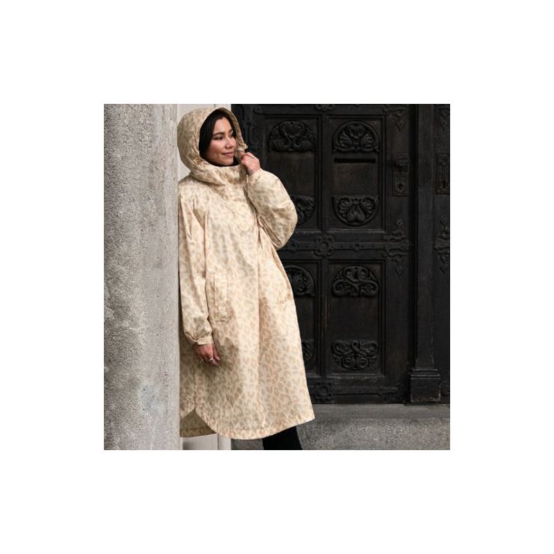 Poncho imperméable ivoire motif léopard