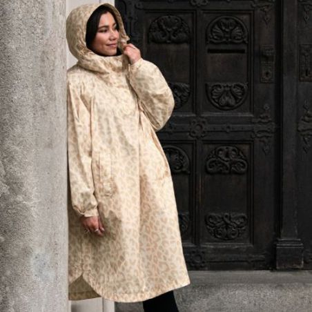 Poncho imperméable ivoire motif léopard