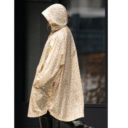 Poncho imperméable ivoire motif léopard