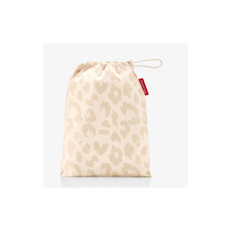 Poncho imperméable ivoire motif léopard