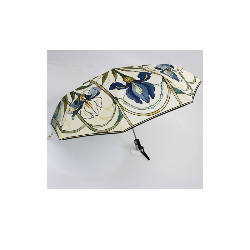 Parapluie pliable haut de gamme automatique motif art déco.